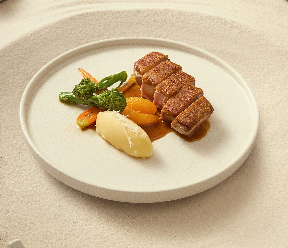 Beef with pommes purée and broccolini