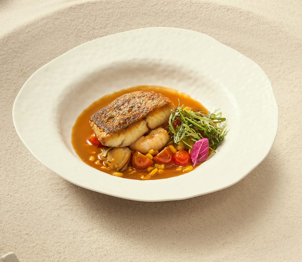 Pan-seared fish in a light broth
