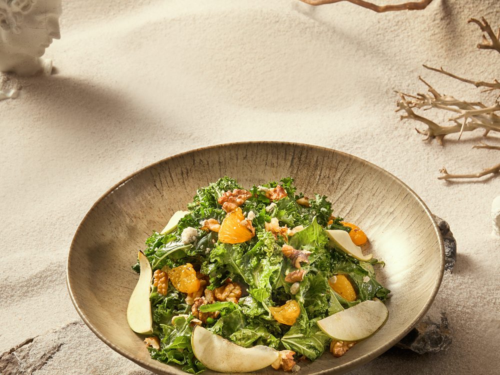 Kale salad with pear, citrus and walnuts